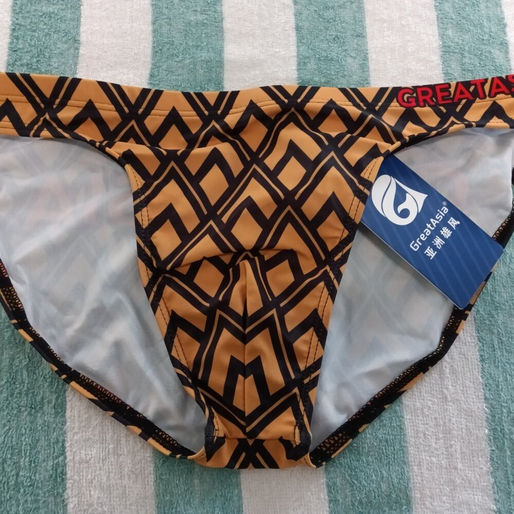 NWT GREAT ASIA TEXT SWIM BRIEF, ASIAN SIZE "L", (~32") GOLD / BLACK PATTERN